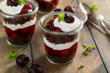 Black forest trifles, dessert in jars concept