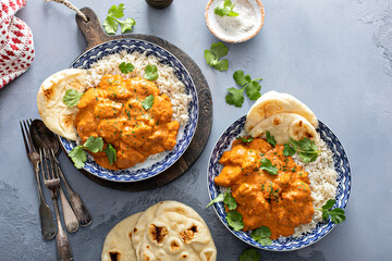 Chicken tikka masala, cooked marinated chicken in spiced curry sauce - obrazy, fototapety, plakaty
