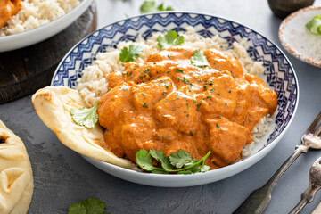 Chicken tikka masala, cooked marinated chicken in spiced curry sauce - obrazy, fototapety, plakaty