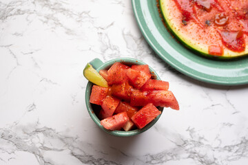 Watermelon with chili powder and chamoy. Mexican food