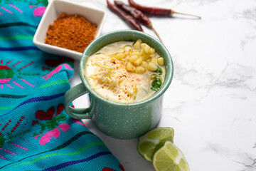 Corn esquites with mayonnaise and cheese. Mexican food
