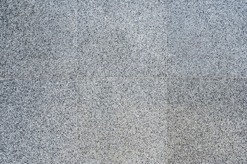 Background texture of gray granite slabs.