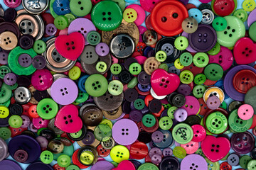 Fototapeta premium Collection of colorful sewing plastic buttons background