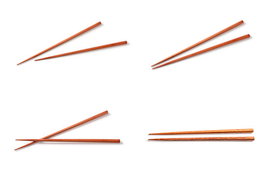 Set of chopsticks on white background.