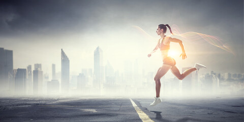 Fototapeta na wymiar Young female runner . Mixed media