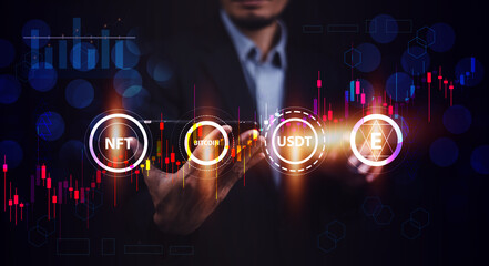 Businessman using smartphone or Tablet trading online in bitcoin forex stock market and other ETH NFT token cryptocurrency