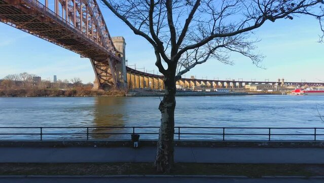 Aerial Trucking Shot of the Hell Gate Bridge and the East River - Part 2