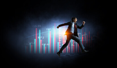 Portrait of energetic businessman running