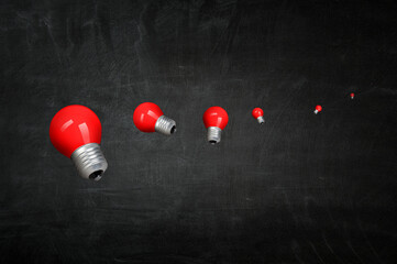 Light bulb on black background