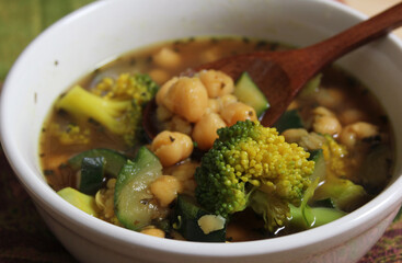 Close up of Bowl of Soup With Garbanzo Beans, Broccoli and Zucchini