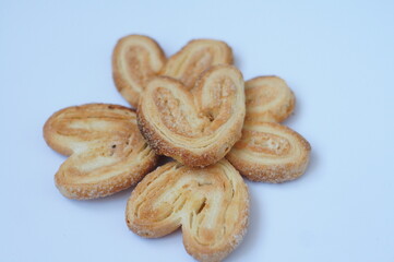 Puff pastry with sugar in the shape of a heart
