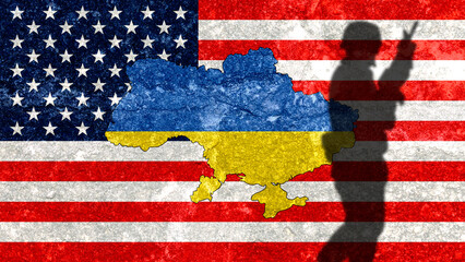 Ukraine map on a wall with the USA flag painted on it. Shadow of a soldier from Russia's war with Ukraine. War conflict between Russia and Ukraine. United States ally of Ukraine