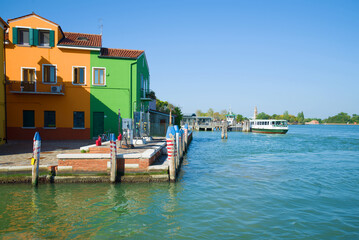 Fototapeta na wymiar Petrol station for small-sized vessels and boats on the city embankment. Burano Island, Venice