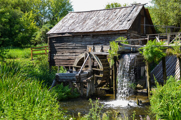 old wooden mill in the forest