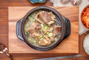 Beef bone soup or Seolleongtang The Most COMFORTING Korean food Served with kimchi, steamed rice, a popular Korean dish.