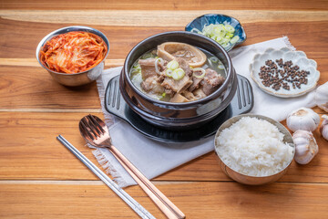 Beef bone soup or Seolleongtang The Most COMFORTING Korean food Served with kimchi, steamed rice, a popular Korean dish.
