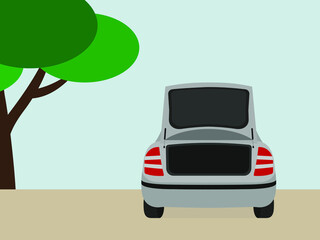 Car with open trunk standing outdoors © Tatyana