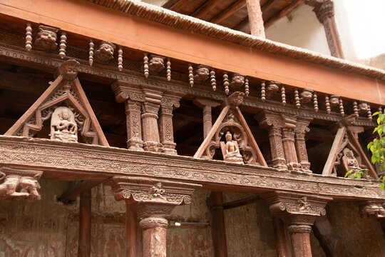 Ancient wooden carving on the entrance to Alchi monastery in Ladakh, India. Alchi monastery is a famous Buddhist temple near Leh, Ladakh,  India..