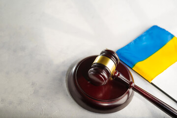 Ukrainian flag Judge gavel and bible book in court, concept of law and justice Russia's aggression...