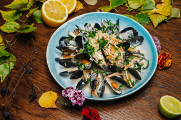 Cooked mussels in cream sauce appetizer for wine. Sea products