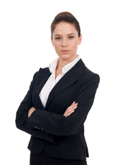 Portrait of a strong business professional. Studio portrait of a confident-looking young business woman with her arms folded isolated on white.