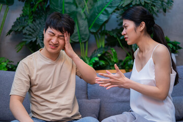 Young Asian couple arguing with each other