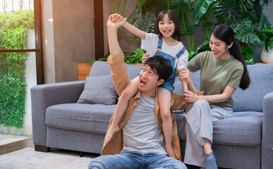 Portrait of young Asian family