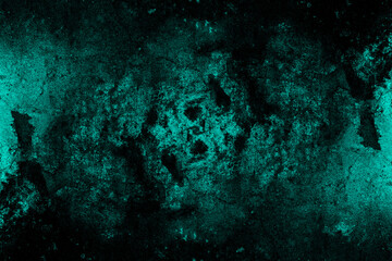 Dark cyan color abandoned old concrete wall with heavy grunge texture and spots for background