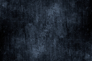 Seamless grunge textured dark concrete wall for background