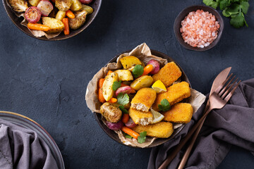 Vegan Plant based fish, fishless fingers with roasted vegetables