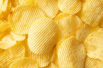 crispy golden potato chips snack texture background