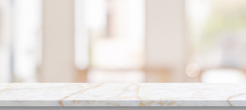 marble table top with blurred kitchen cafe restaurant interior background