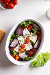 Baked feta cheese with vegetables