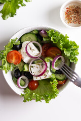 Greek salad with feta cheese and red onion