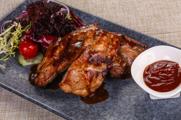 Grilled pork ribs with celery and carrot