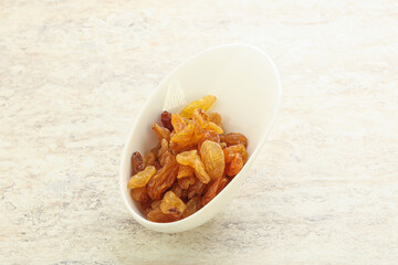 Sweet yellow raisin in the bowl