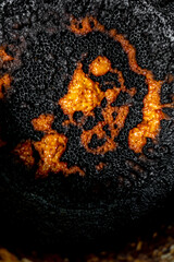 Deep dark abstract yellow-orange burning cream texture. Milk burning pots orange-yellow bubble...