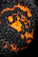 Deep dark abstract yellow-orange burning cream texture. Milk burning pots orange-yellow bubble...