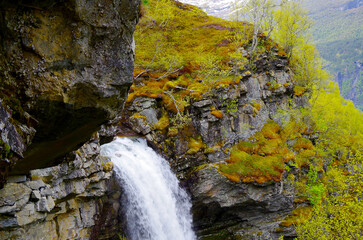 Breathtaking scenery of mountains, galciers and waterfalls in Geirangerfjord during cruising to...