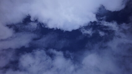 The moon night view with the bright moon in the dark sky at night