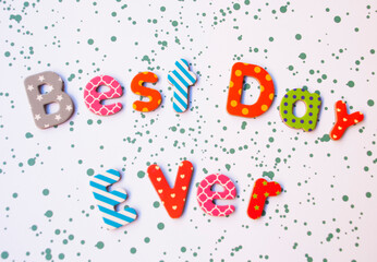 Simple card with text best day ever of different colorful letters.