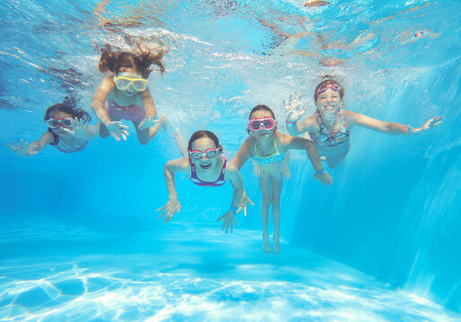 kids swimming  in pool