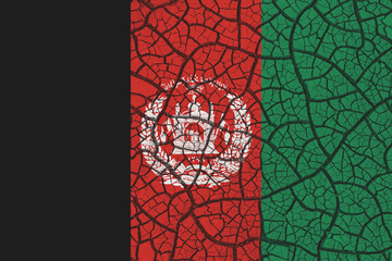 Concept of Afghanistan flag on a mud texture of dry crack on the ground