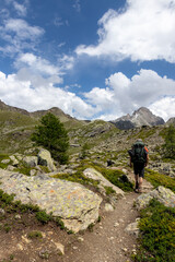 Hiking up a hill in the Aosta mountain range in late spring