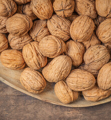 Walnuts top view wallpaper.  Fresh Walnut Background close up.