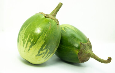 Two eggplants on white background