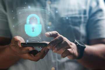 cybersecurity concept Business man shows how to protect cyber technology network from attack by hackers on the internet. Secure access to privacy through smartphones Meta protection.

