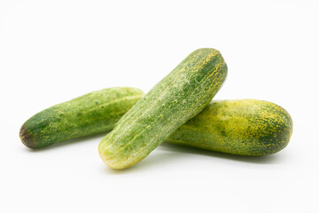 fresh green cucumber over on white background