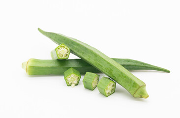 okra or Lady Finger pieces over on white banckground