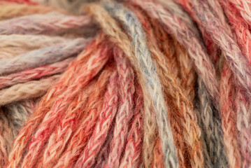The Netherlands, February 2022. Close up of colored wool on a white background.